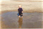 kid-in-puddle.jpg (246513 bytes)