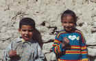 Two children in the village of al-Qasr